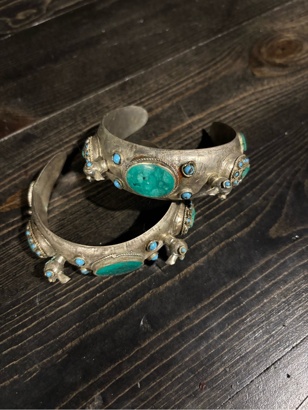 Pair of antique handmade afghan cuff bracelets peacock design